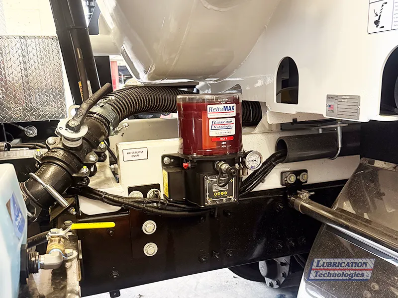 ReliaMAX automatic grease pump installed on Camel 1200 vacuum truck