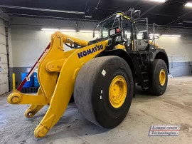 Komatsu WA500-8 Wheel Loader in shop during automatic lubrication system installation