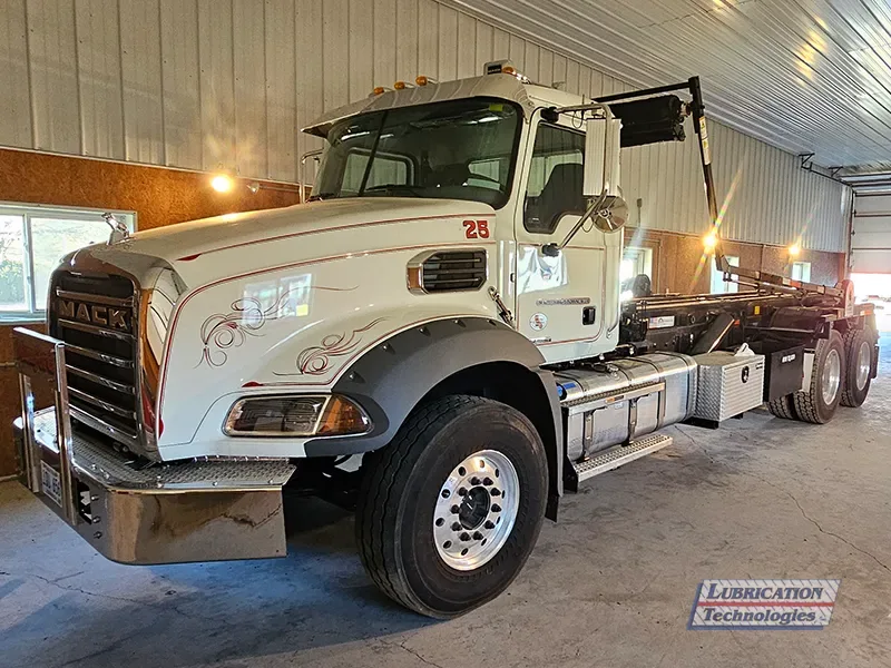 mack-granite-truck-w-american-rolloff-body-2024-1